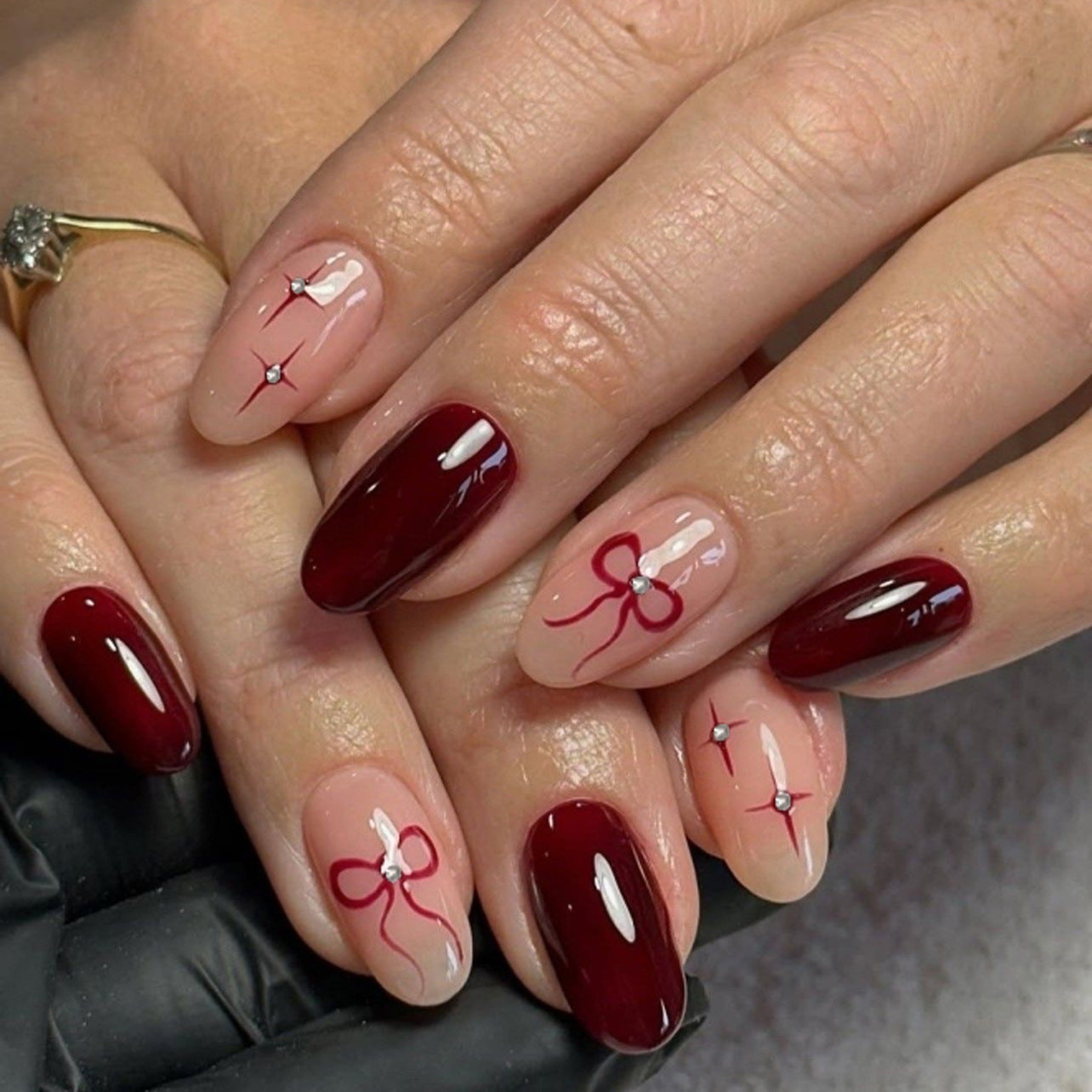 Chic Elegance Medium Almond Burgundy and Beige Press on Nail Set with Sparkling Bow Accents