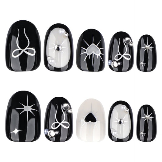 Mystical Elegance Black and White Medium Squoval Nails with Stunning Gem Accents