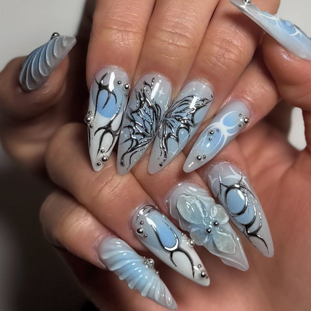 Ocean Breeze Long Almond Blue Gradient Press On Nail Set with Intricate Floral Design and Metallic Accents