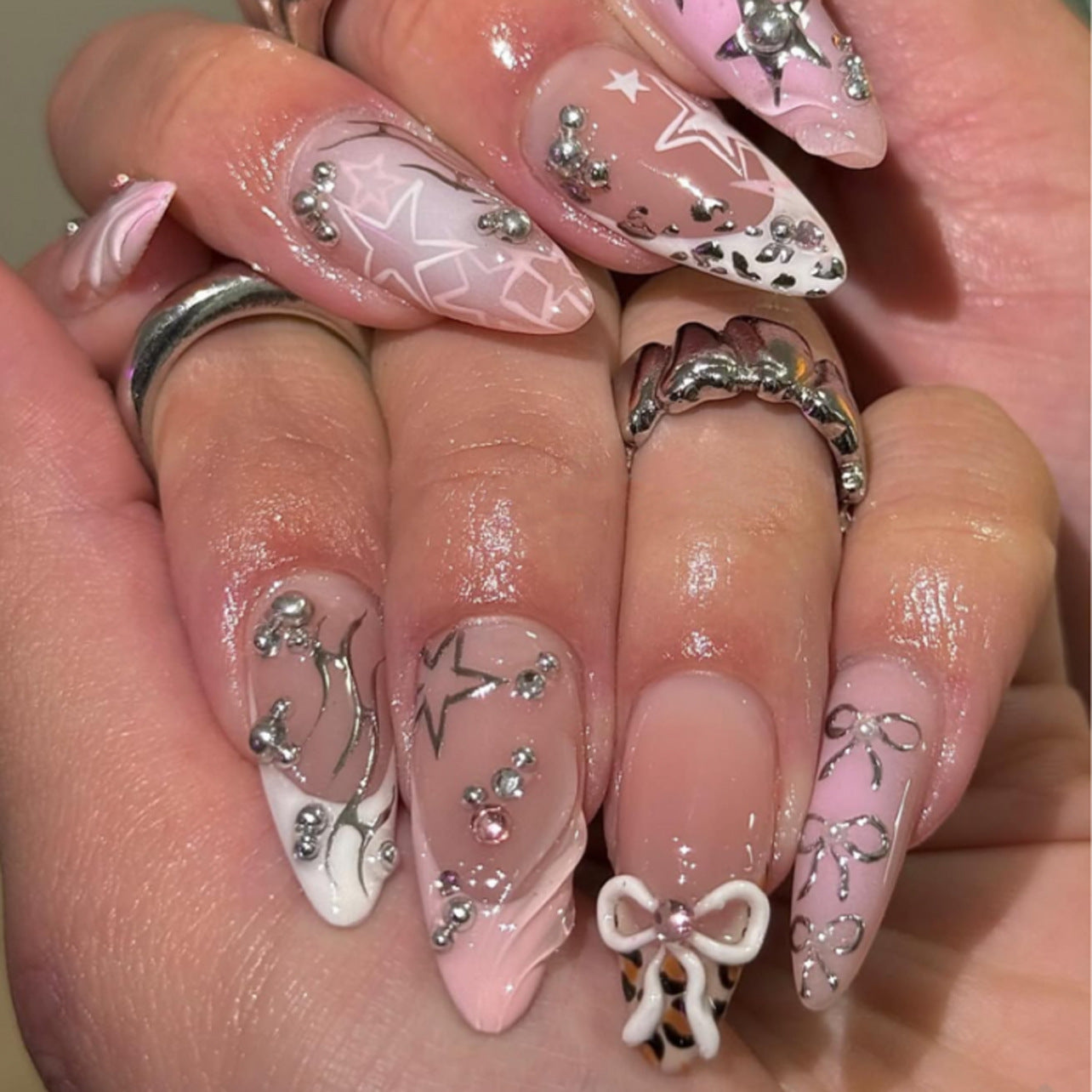 Whimsical Starry Night Long Almond Pink Press-On Nail Set with Charming Bow and Gem Embellishments