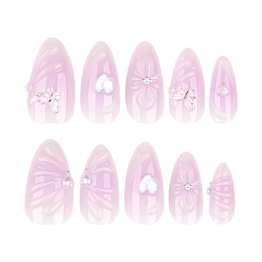Whimsical Dreams Medium Almond Pale Pink Nail Set with Charming Floral Embellishments