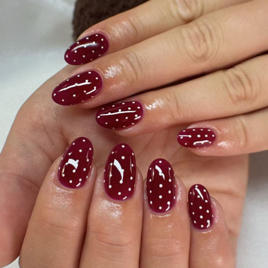 Chic Elegance Medium Oval Burgundy Press on Nail Set with Charming Polka Dots