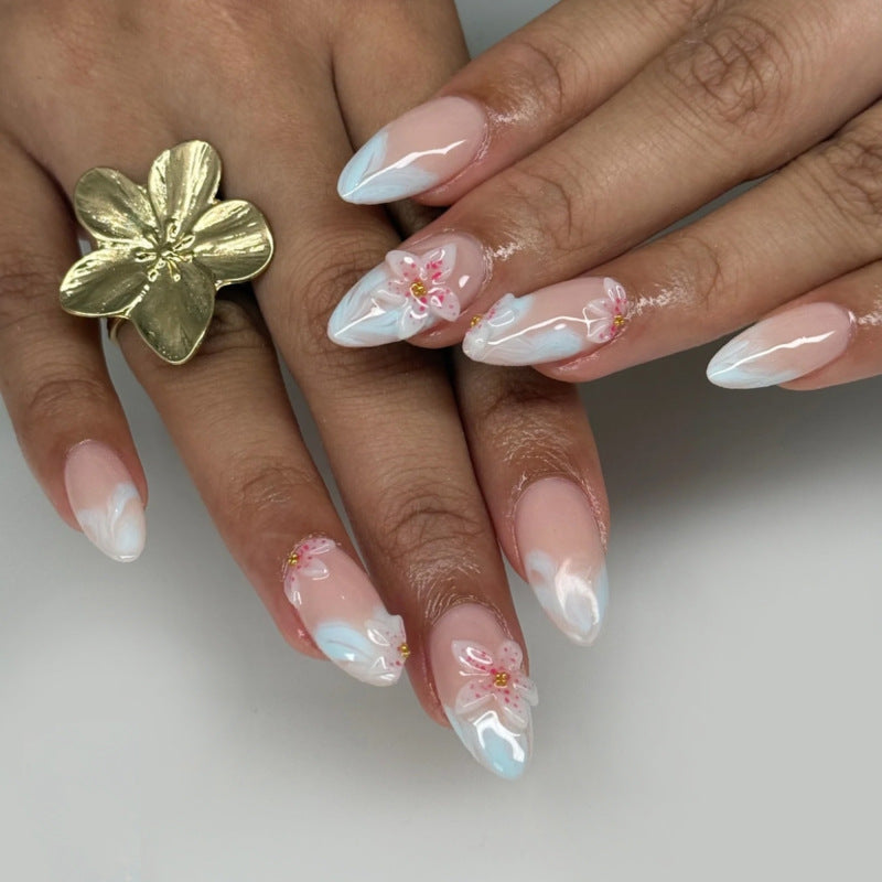 Whimsical Floral Elegance Medium Almond Shaped Pastel Blue with Charming Flower Accents Press On Nail Set