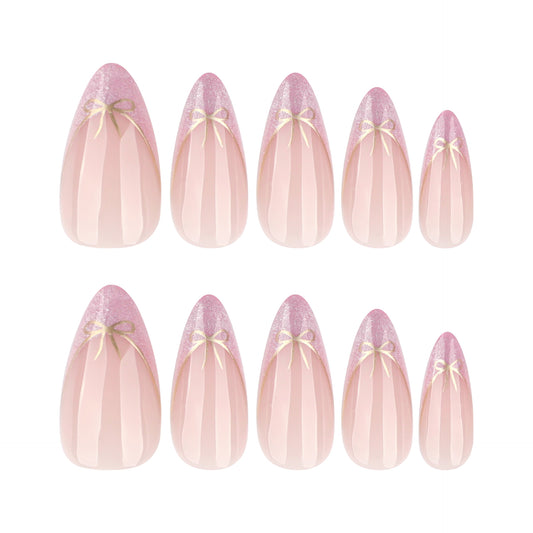 Whimsical Fairy Tale Long Almond Press On Nails in Soft Pink with Delicate Gold Bow Accents