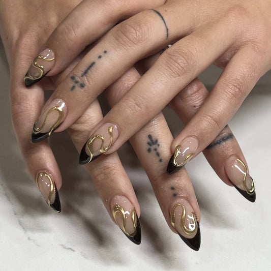 Glamorous Nightfall Elegant Long Almond Press On Nail Set in Ombre Black with Unique Gold Swirl Design
