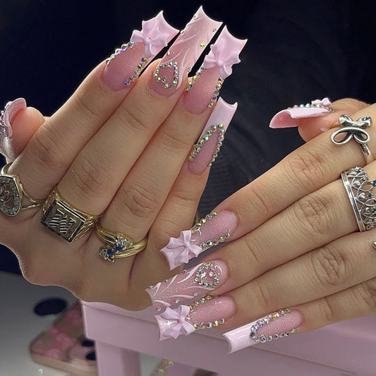 Dreamy Pink Starburst Long Square Press-On Nail Set with Glittering Gem Accents and Charming Bow Designs