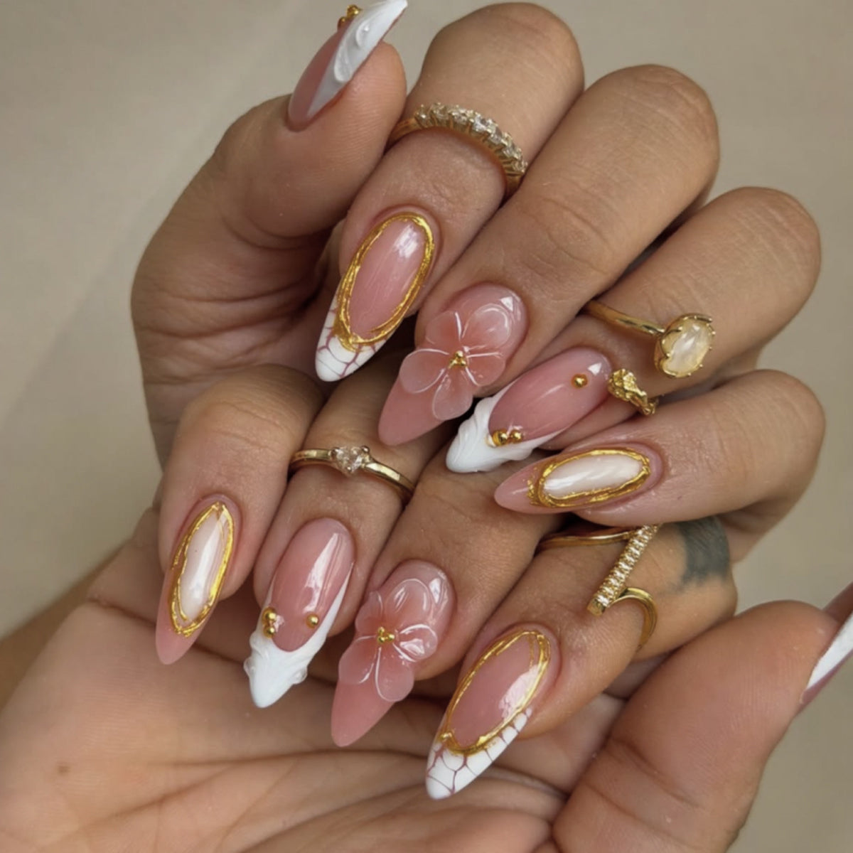 Elegant Blossom Long Almond Pink Nails with Gold Accents