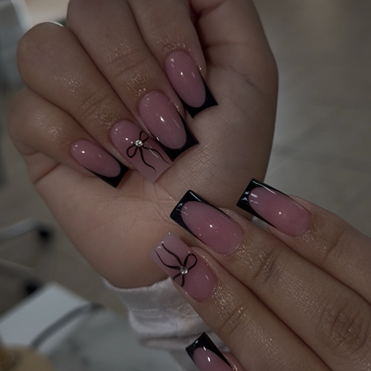 Chic Glamour Long Square Blush Pink Press on Nail Set with Elegant Black Tips and Bow Decoration