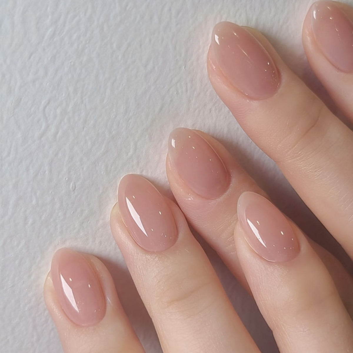 Blush Elegance Medium Almond Neutral Nails with High Gloss Finish