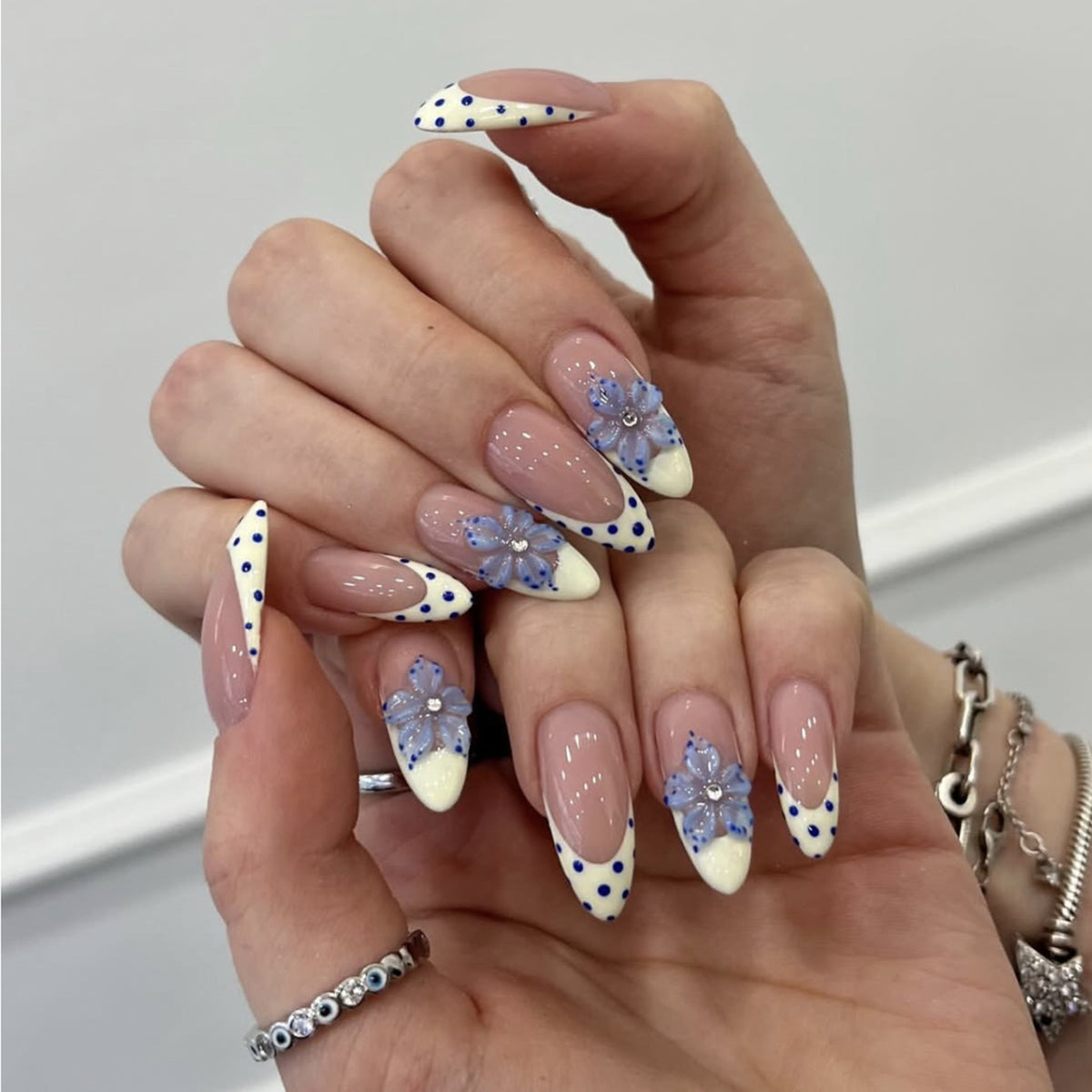 Floral Fantasy Medium Almond Blue and White Polka Dot Design with Elegant Flower Accents