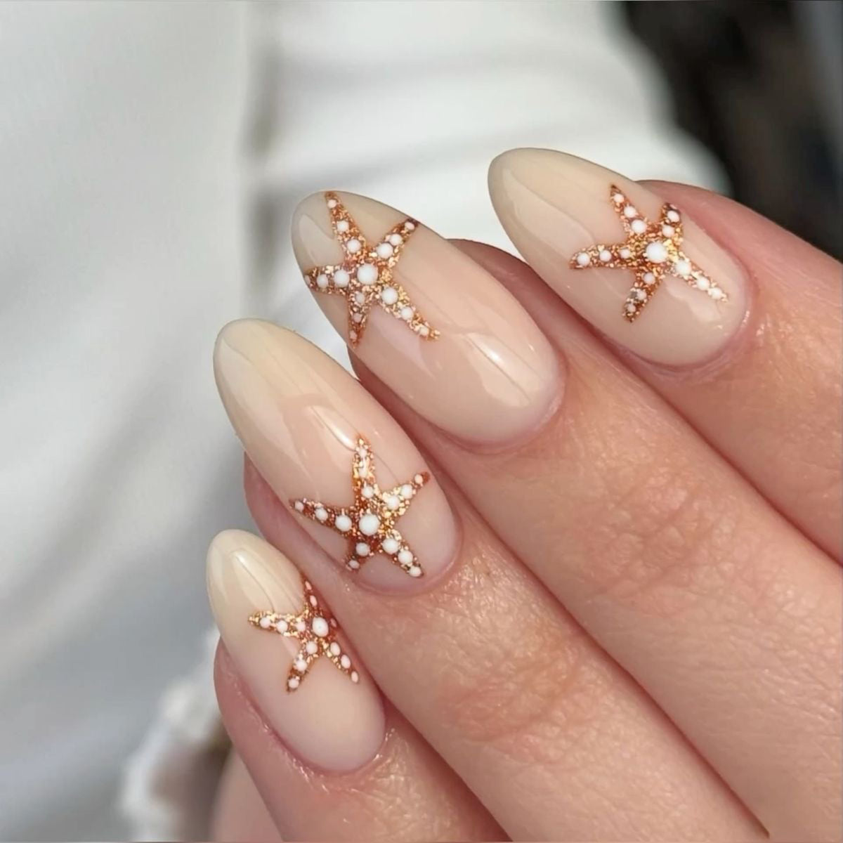 Ocean Breeze Medium Almond Beige with Starfish Accents Press On Nail Set