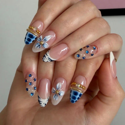 Charming Floral Elegance Medium Almond Clear with Blue Accents and Golden Details Press on Nail Set