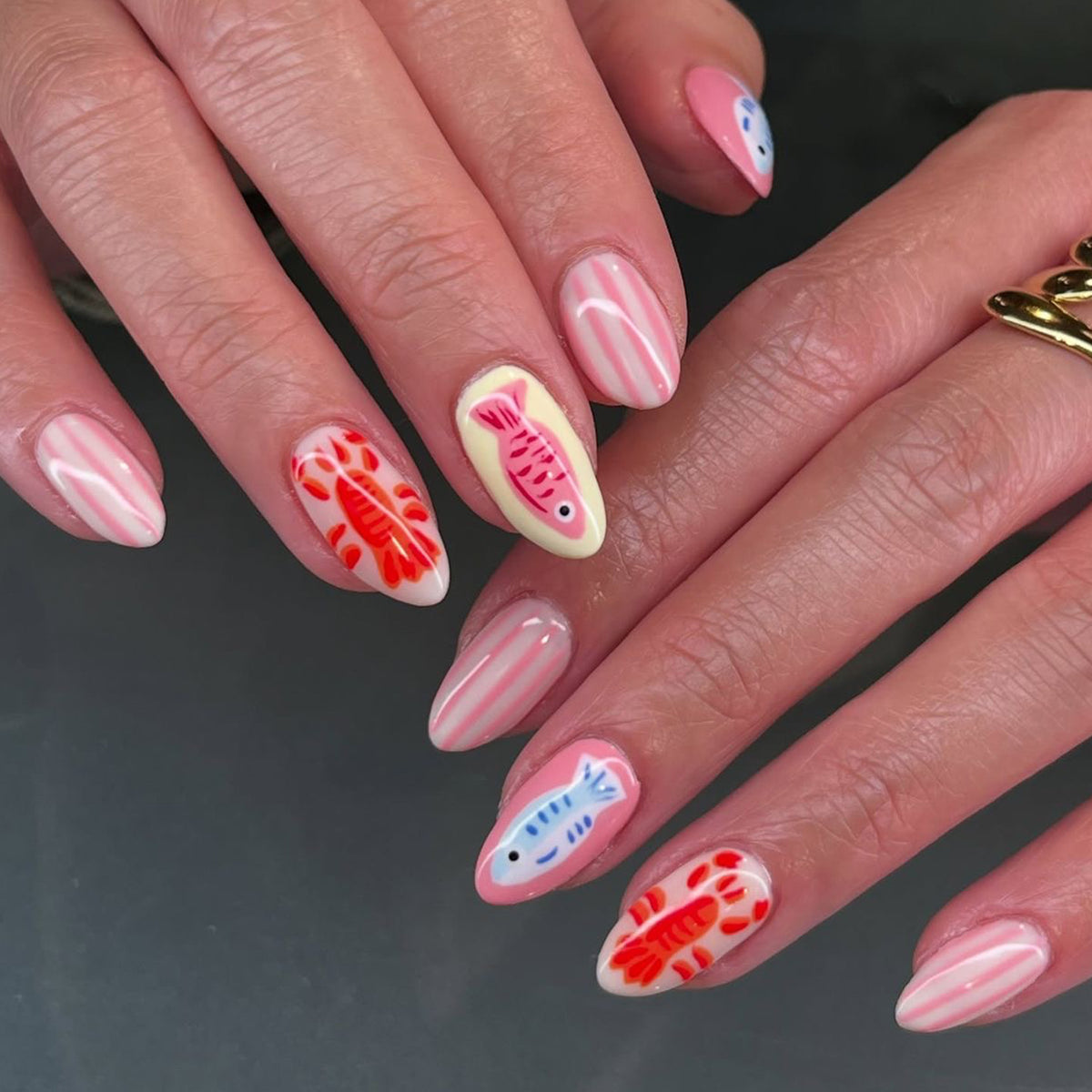 Whimsical Seafood Inspired Medium Oval Pink with Unique Fish Art Press on Nail Set