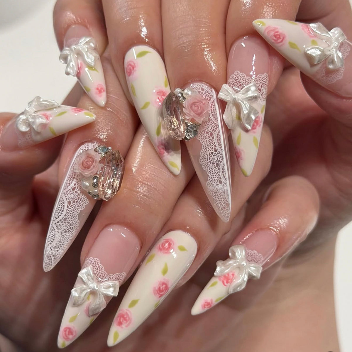 Romantic Floral Long Stiletto Pink Nail Set with Elegant Lace and Gem Accents