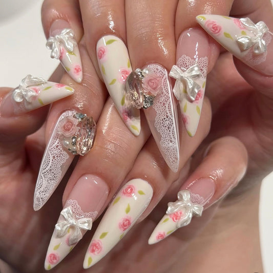 Romantic Floral Long Stiletto Pink Nail Set with Elegant Lace and Gem Accents