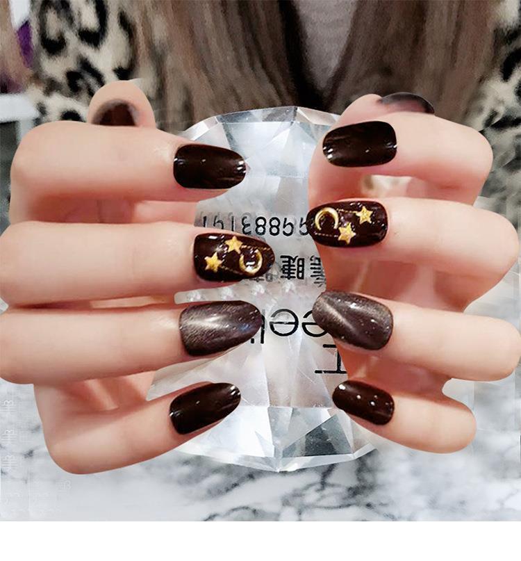 Celestial Elegance Long Oval-Shaped Dark Brown Press On Nail Set with Star and Moon Design