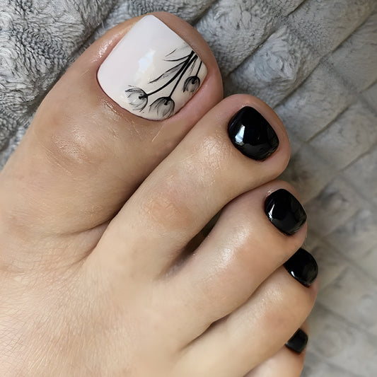 Elegant Floral Elegance Short-Length Oval Press-On Nails in Classic Black and White with Artistic Flower Accents