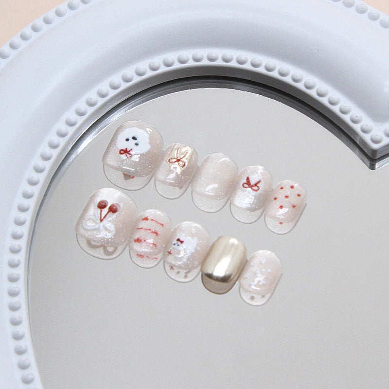 Whimsical Winter Pastel Short Squoval Press On Nail Set with Glitter Accents and Cute Character Designs