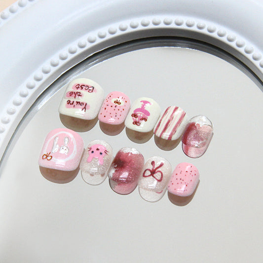 Charming Pastel Delight Short Squoval Pink Multi-Patterned Nail Set with Cute Illustrations