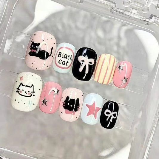 Whimsical Cat Collection Short Oval Pink and Black Colorful Design with Adorable Patterns Press On Nail Set
