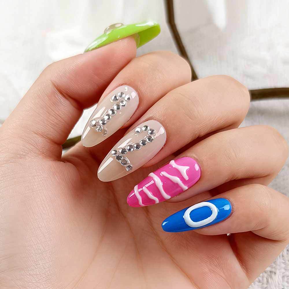 Whimsical Dream Long Almond Glossy Green Pink and Blue Nail Set with Unique Rhinestone Accents