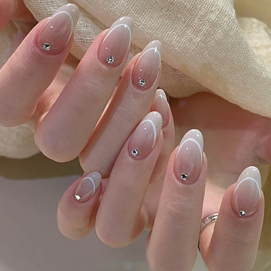 Elegant Garden Bliss Long Oval White Ombre Nails with Dazzling Rhinestones