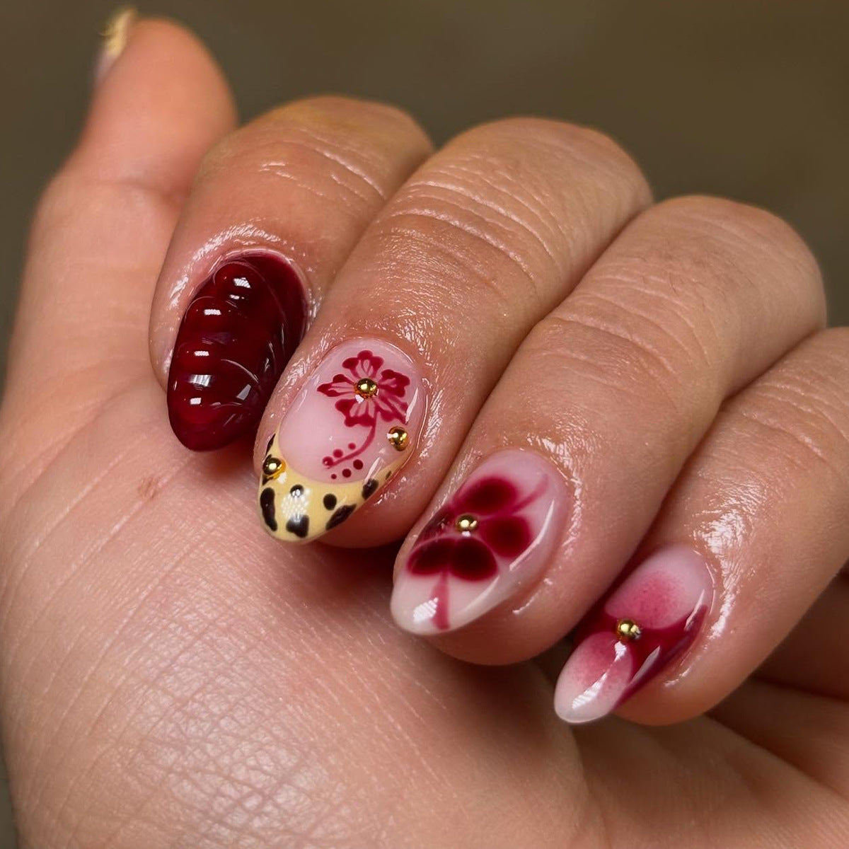 Glamorous Floral Elegance Medium Almond Burgundy with Gold Accents and Unique Textured Design Press-On Nail Set