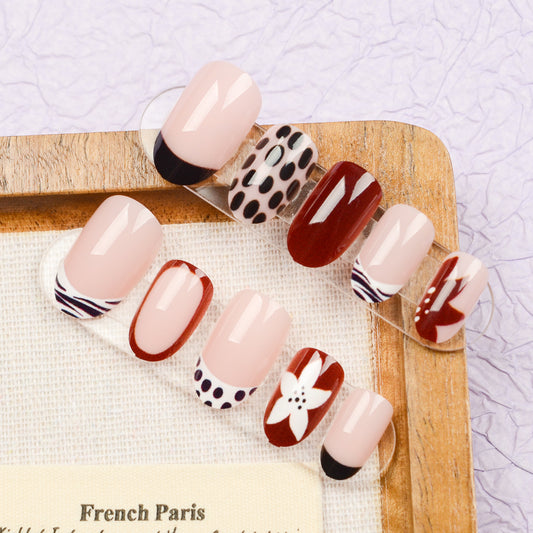 Chic Parisian Elegance Glossy Medium Oval Pink and Burgundy Nail Set with Artistic Floral and Polka Dot Designs