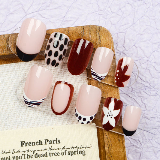 Chic Parisian Elegance Medium Oval Blush Burgundy and Black with Floral Accents Press On Nail Set