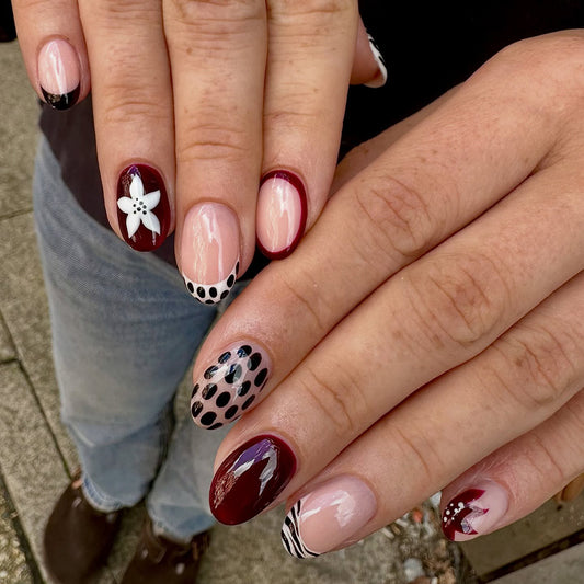 Bohemian Chic Medium Oval Burgundy and Clear press on nail set with playful polka dot and floral designs
