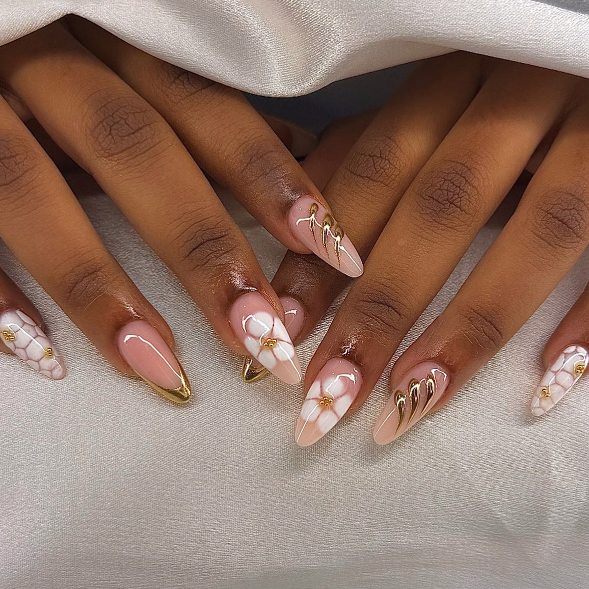 Chic Floral Elegance Long Almond Shaped Beige and White Press-On Nail Set with Gold Accents