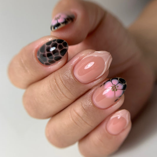 Elegant Garden Inspired Medium Almond Soft Pink with Chic Floral and Bold Graphic Accent Nail Set