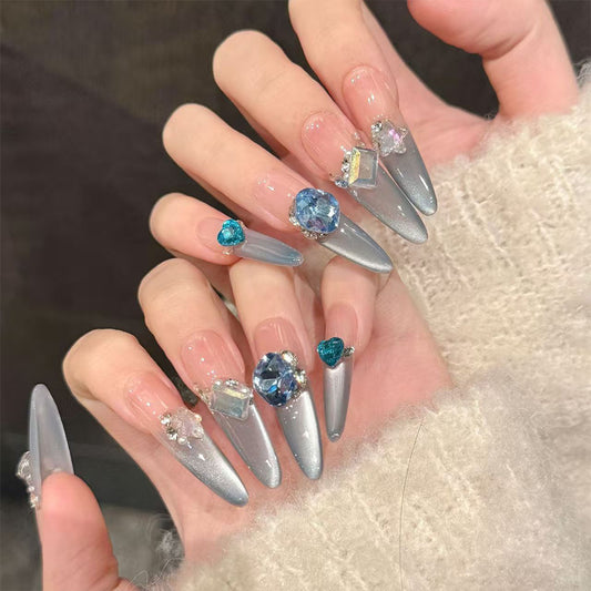 Enchanting Ocean Mist Long Almond Gray Nails with Sparkling Gem Accents