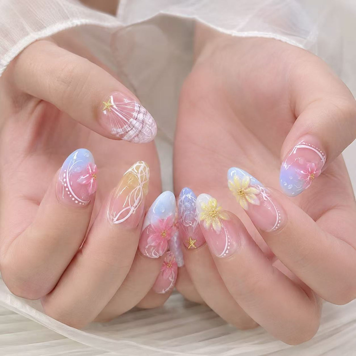Whimsical Floral Charm Short Almond Blue Pink Press On Nail Set with Glitter Accents