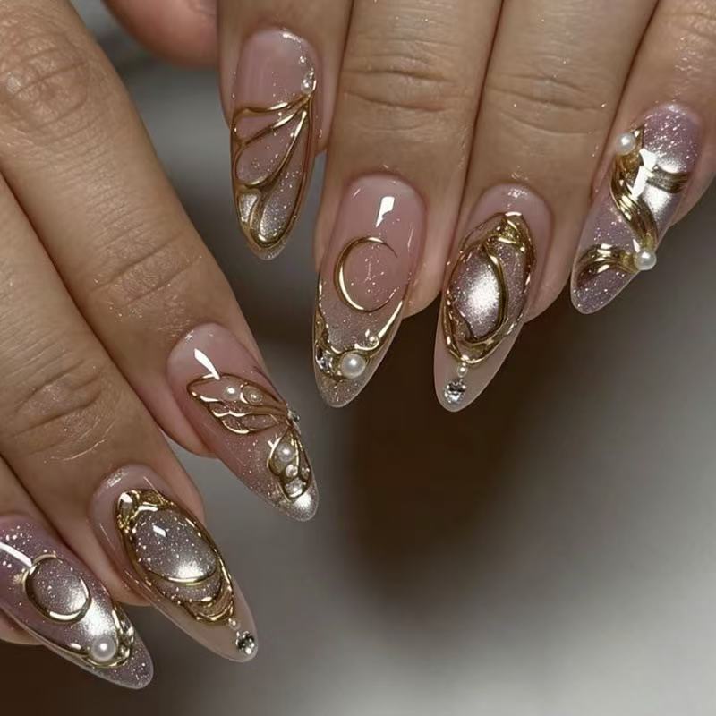 Glamorous Celestial Medium Almond Pink Glitter Nail Set with Elegant Gold Accents
