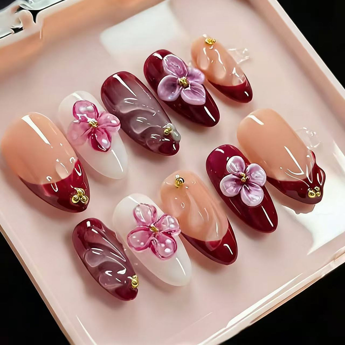 Blossoming Elegance Medium Almond Burgundy with Floral Embellishments Nail Set