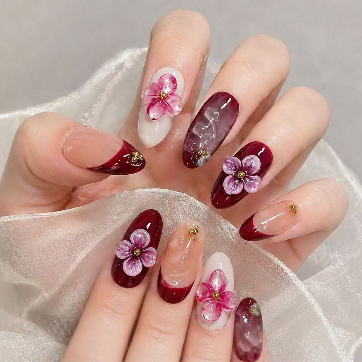 Floral Elegance Long Almond Burgundy Press on Nail Set with Three Dimensional Flower Accents