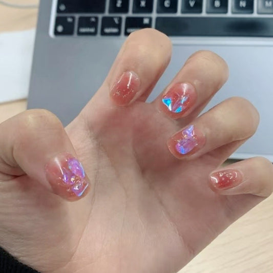 Enchanted Coral Medium Oval Press On Nail Set with Iridescent Sparkle Design