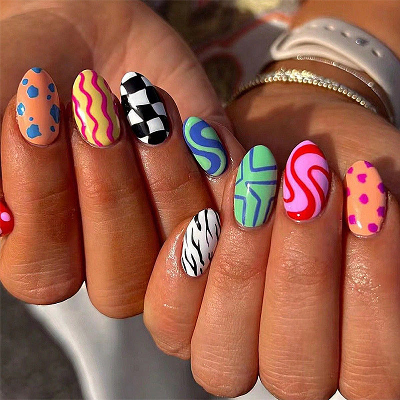 Whimsical Colorful Medium Oval Shaped Press On Nail Set with Bold Abstract Patterns