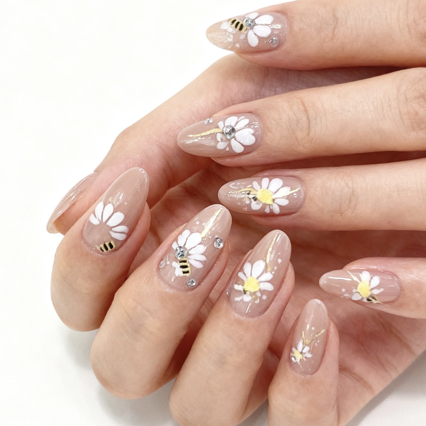 Blooming Garden Press On Nails in Long Almond Shape Soft Beige with Floral and Bee Design