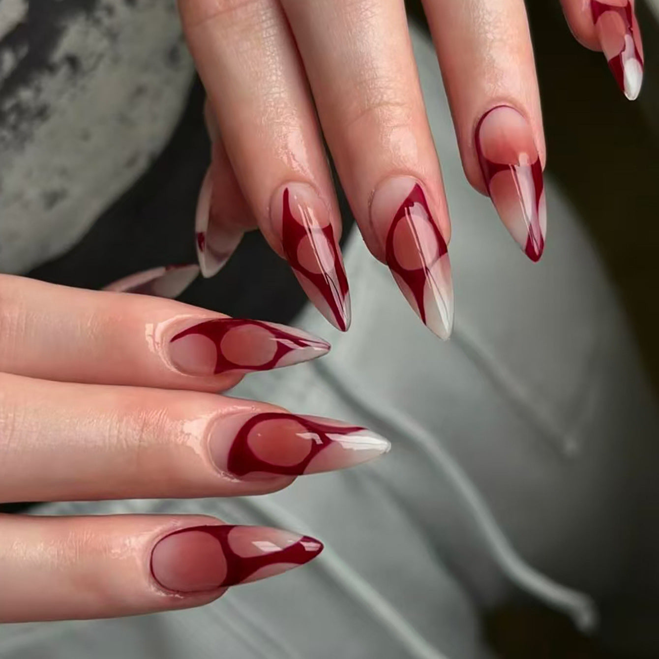 Gothic Elegance Long Stiletto Tipped Burgundy and Clear Press On Nail Set with Unique Marble Design