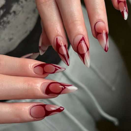 Gothic Elegance Long Stiletto Tipped Burgundy and Clear Press On Nail Set with Unique Marble Design