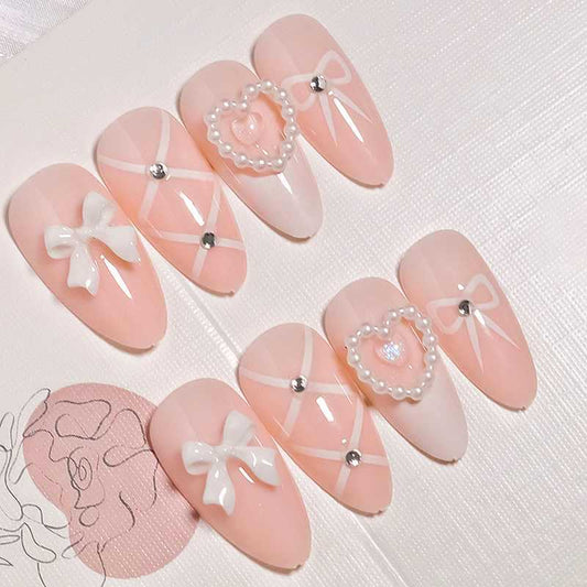 Charming Pastel Long Almond Pink Press On Nail Set with Pearl and Bow Accents