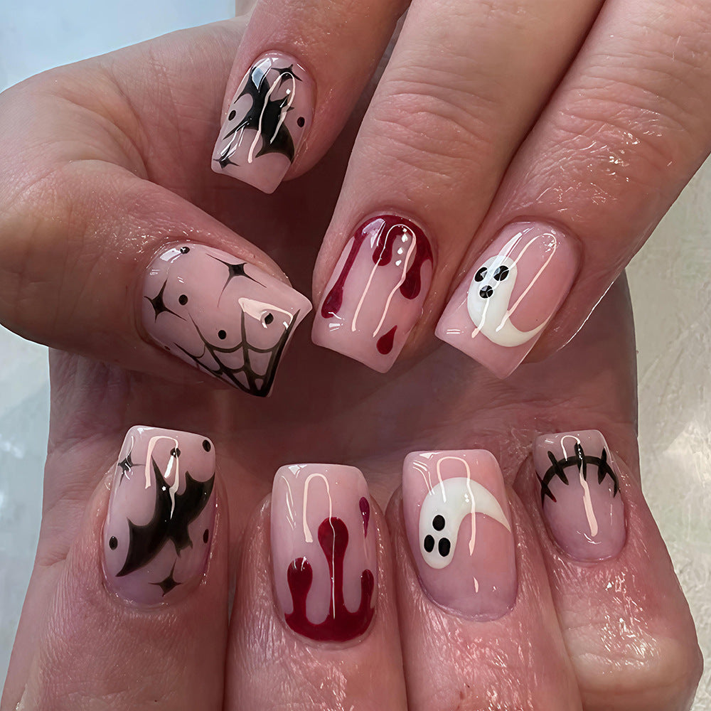 Spooky Glamour Medium Square Pink Press-On Nail Set with Haunting Designs
