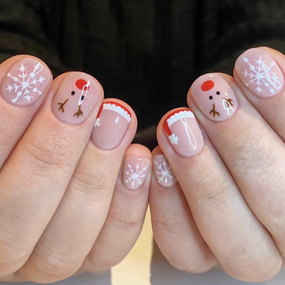 Festive Short Squoval Beige Nails with Snowflake and Reindeer Design