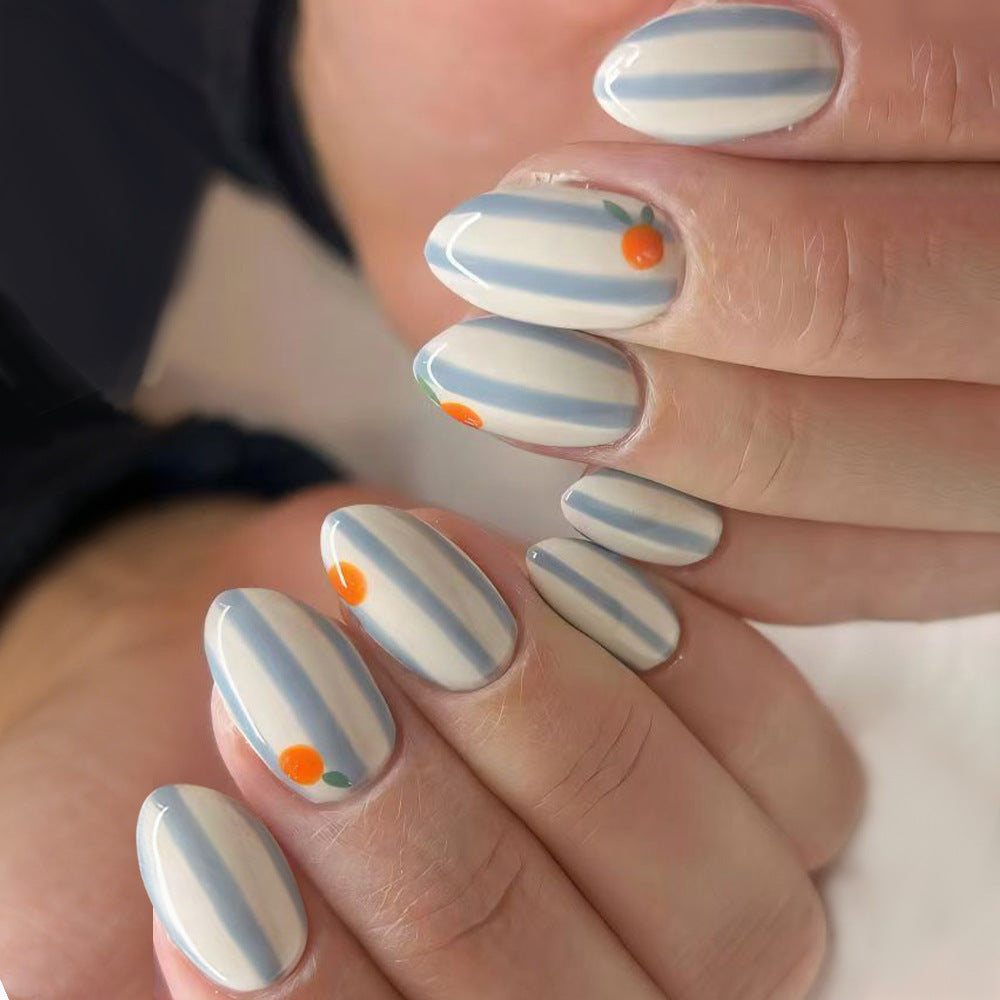 Citrus Breeze Medium Almond Blue Striped Nail Set with Orange Accents