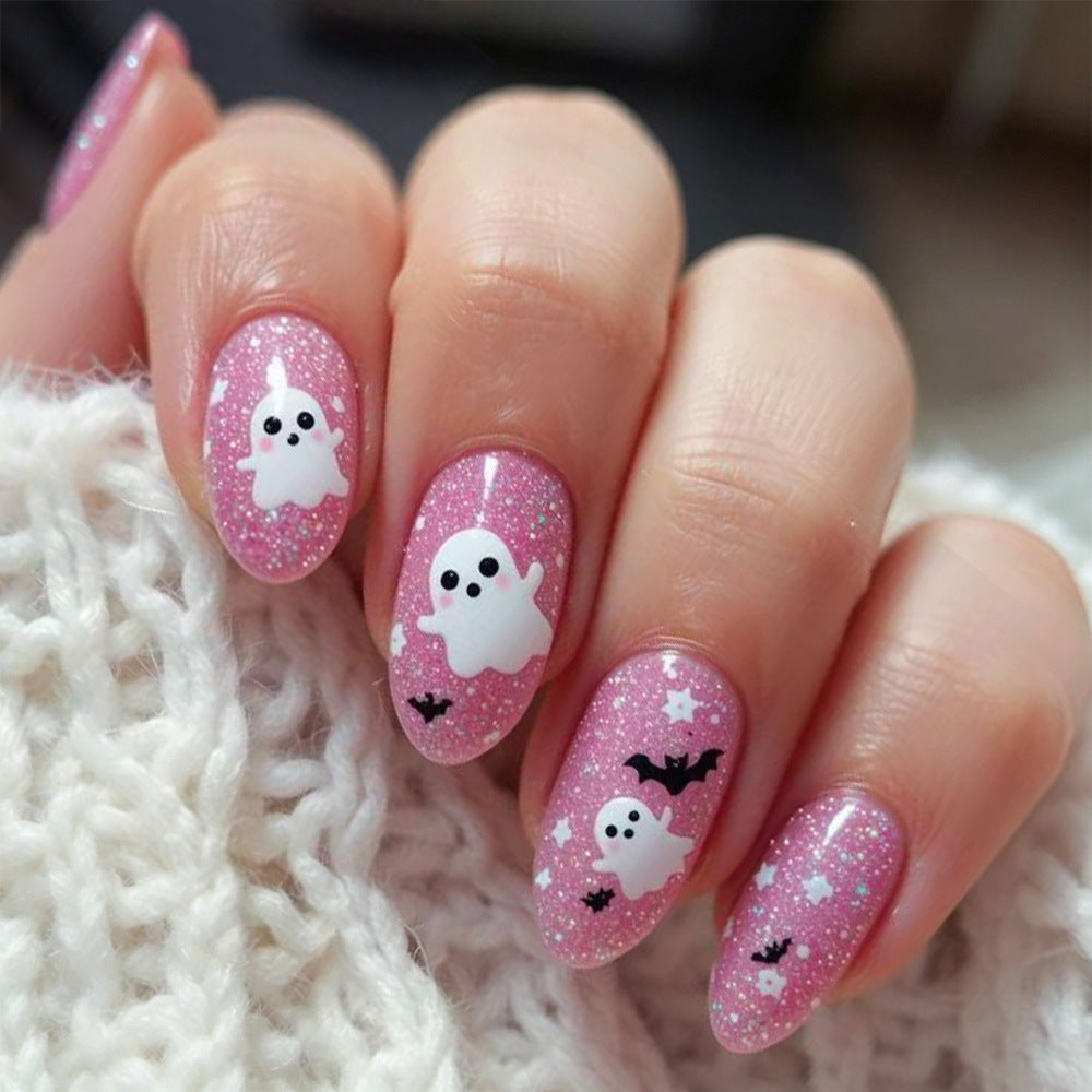 Hauntingly Cute Long Almond Pink Glitter Nail Set with Ghost and Bat Design