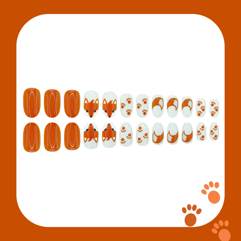 Fox Inspired Short Oval Orange Nail Set with Unique Fox and Paw Print Designs