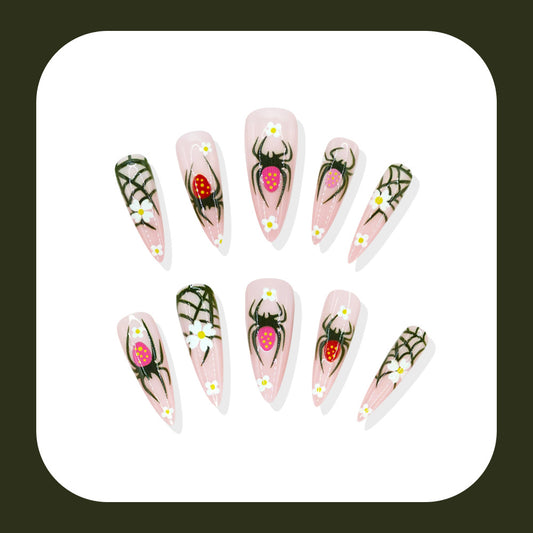 Spooky Chic Long Stiletto Pink Nails with Spider and Strawberry Design