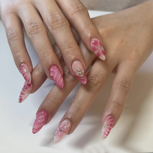 Tropical Bliss Medium Almond Pink Nails with Unique Textured Design and Sparkling Gem Accents
